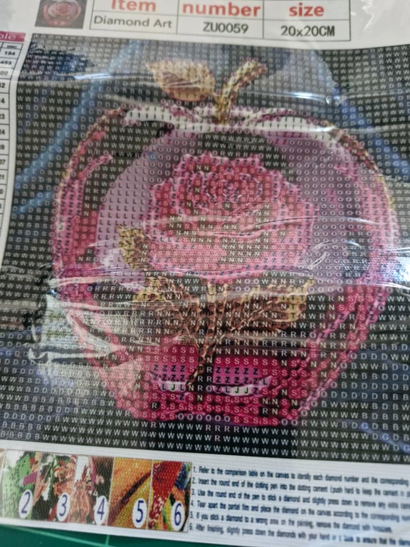 Her er der et rigtig pænt billede med et hjerte på og inde i er der en rose og den er 20/20