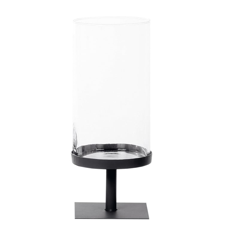 Sort metalstage med cylindrisk gennemsigtig glasoverdel til lys.