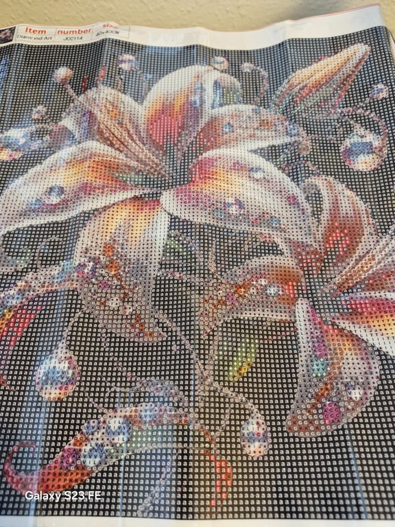 Her er der et rigtig pænt billede med nogle blomster og den er 40×40 