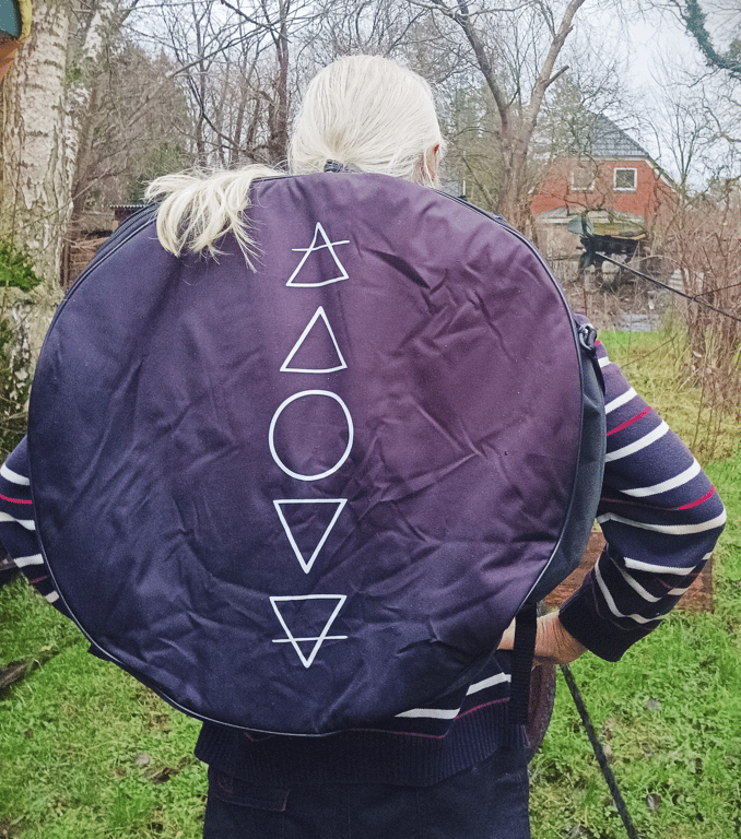 Trommetaske med symboler