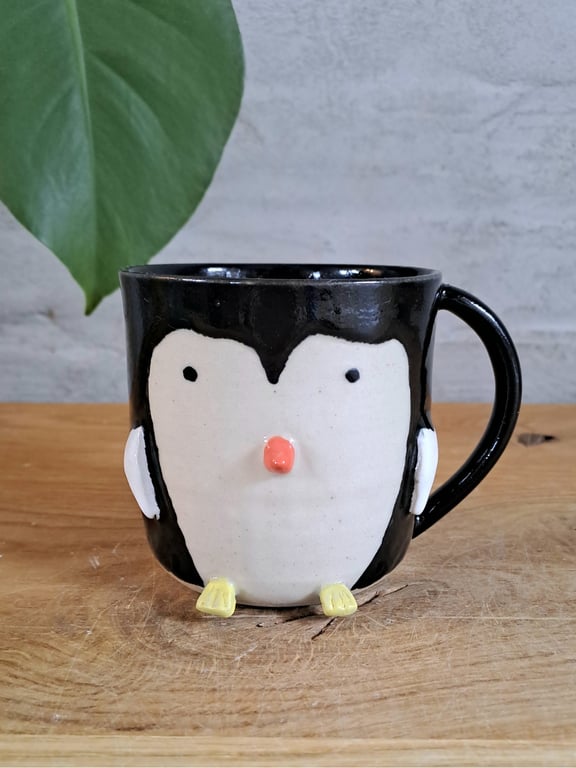 Pingvin koppen kan indeholde 375 ml.