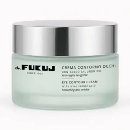 Billede af en glasbeholder med sølvfarvet låg, der indeholder øjencreme med hyaluronsyre fra mærket dr. FUKUJI.