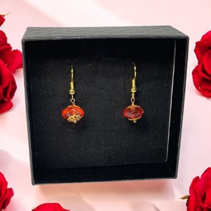 Røde øreringe  – produktbillede