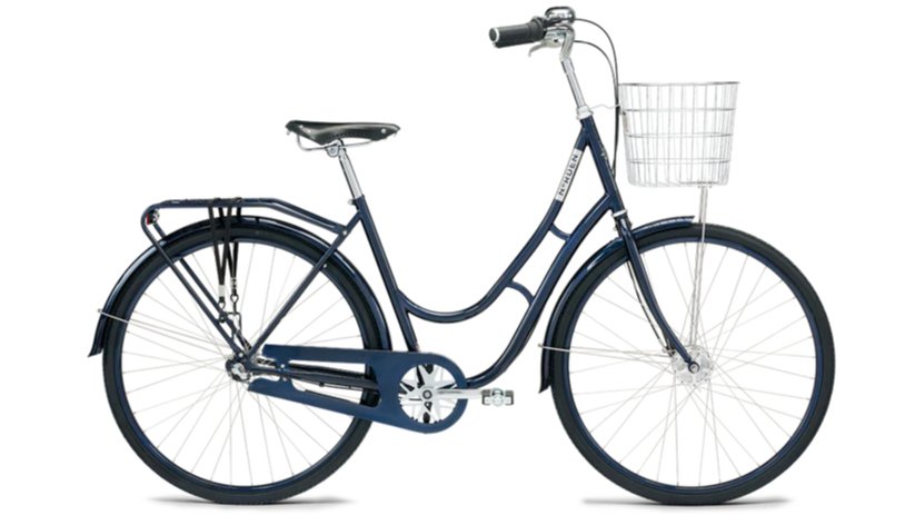 Blå damecykel med kurv foran, bagagebærer og lav indstigning.