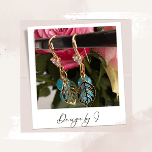 Sæt med smukke laguneblå øreringe og halskæde – produktbillede