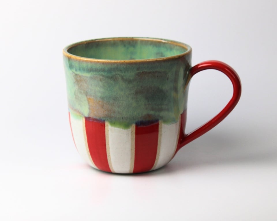 Stor tivoli kop, turkis og rød hank