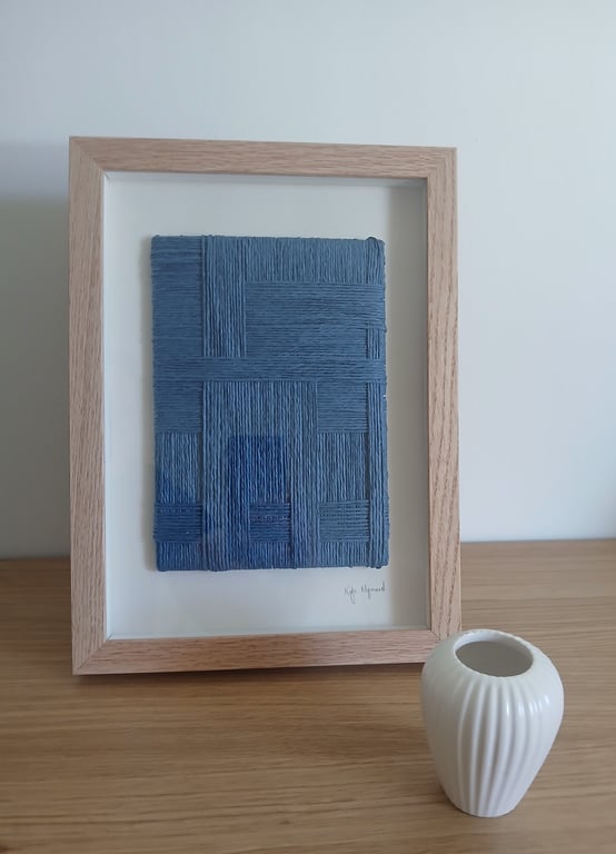 A4, relief papirværk, blå, indrammet 