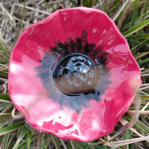 Blomst på stilk rød