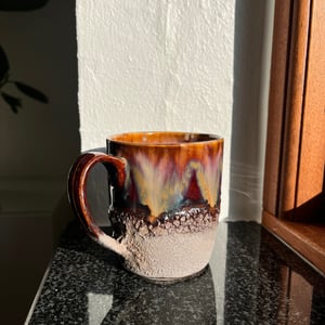 Kop med varme farver – produktbillede