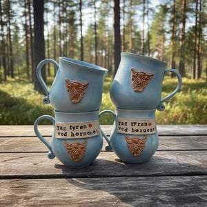 Keramik krus med tekst  - Tag tyren ved hornene – produktbillede