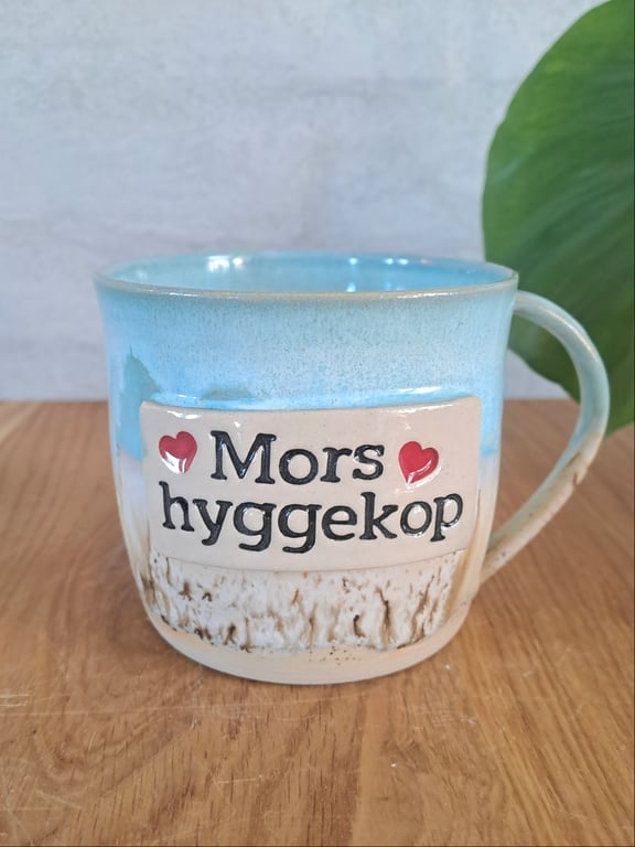 Mors hyggekop kan indeholde 400 ml.