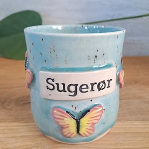 Holder til sugerør - den er 10 cm høj – produktbillede