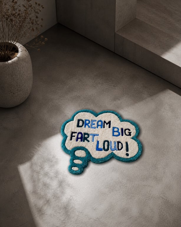 "Dream big fart loud" tuftet tæppe. 