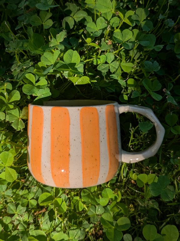 kop med orange striber