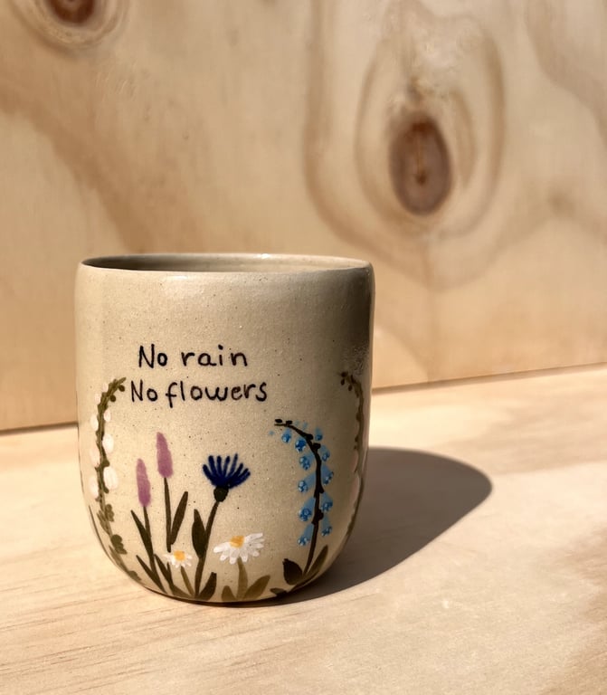 Flora-kop med tekst