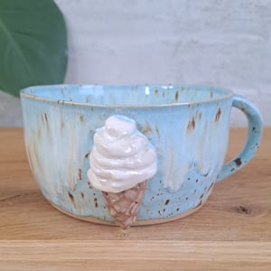 Is skål/koppen er 12 cm i diameter og 6,5 cm høj   – produktbillede