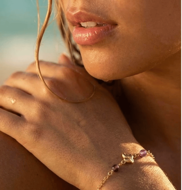 Bracelet with purple beads and vintage leaf 
