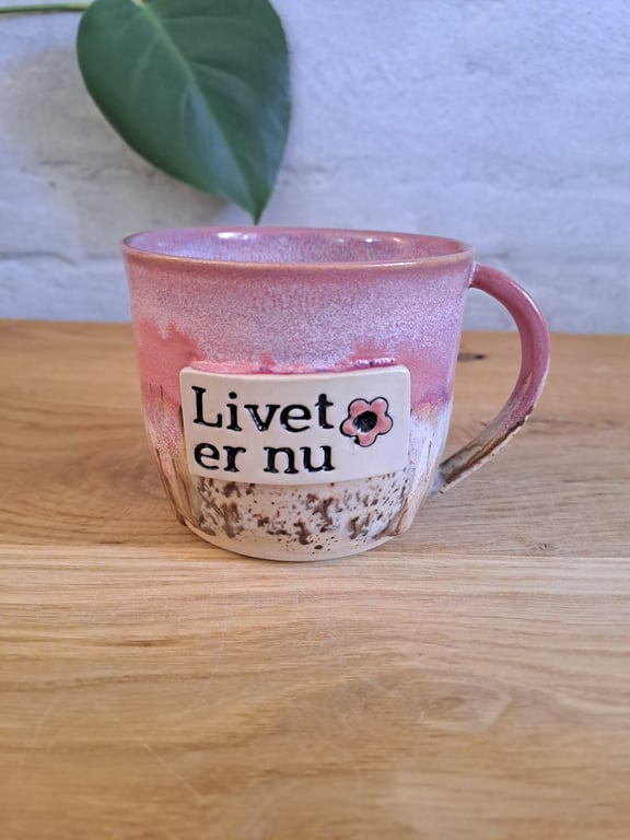 Livet er nu koppen kan indeholde 350 ml.