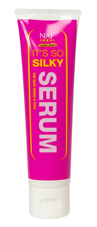 Rør med NAF It's So Silky serum til silkebløde hove og haler, pink og hvid emballage.