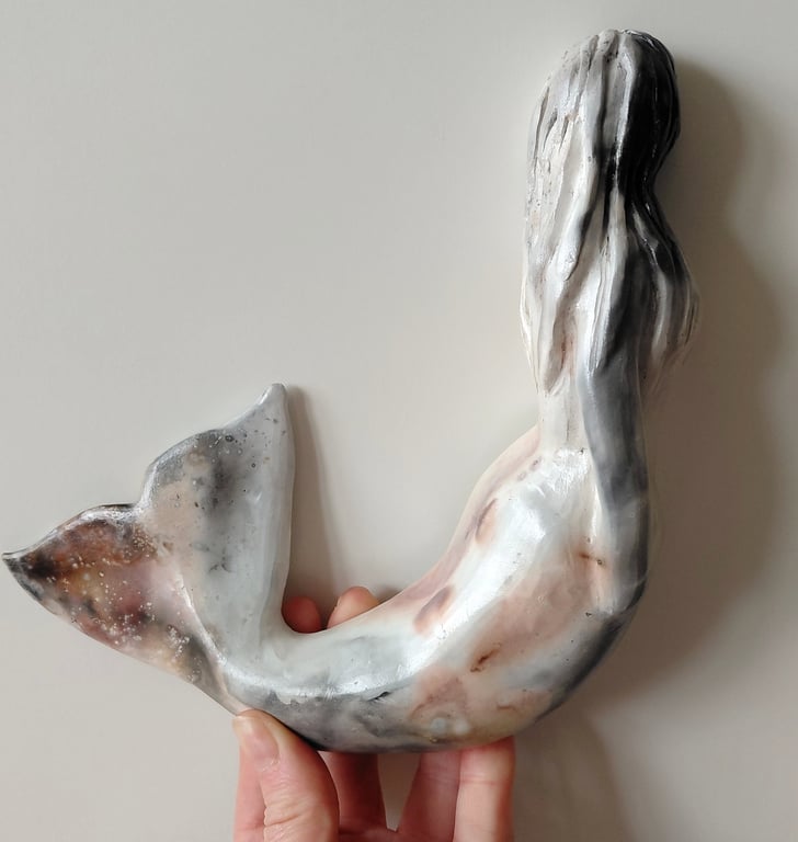 væghængt havfrue skulptur