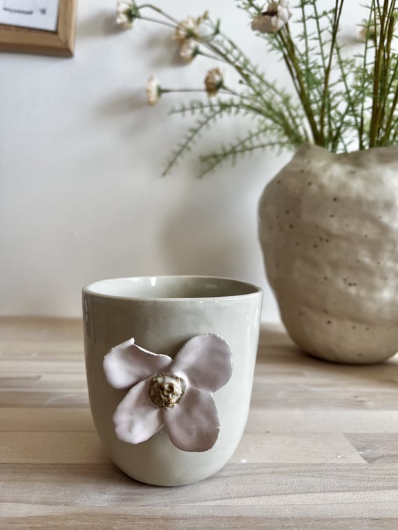 Lyserød blomsterkop