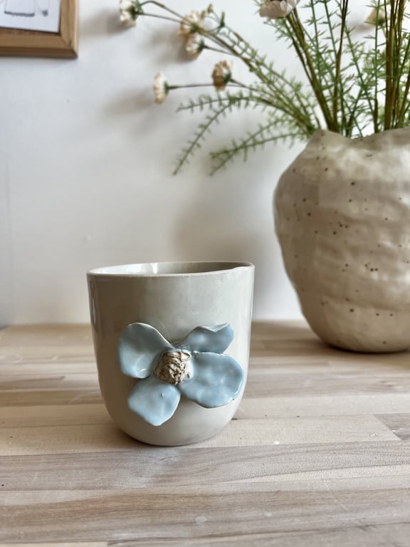 lyseblå blomsterkop