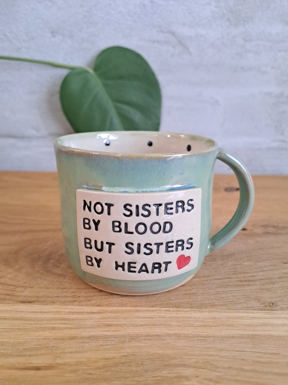 Sisters koppen kan indeholde 325 ml.