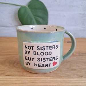 Sisters koppen kan indeholde 325 ml. – produktbillede