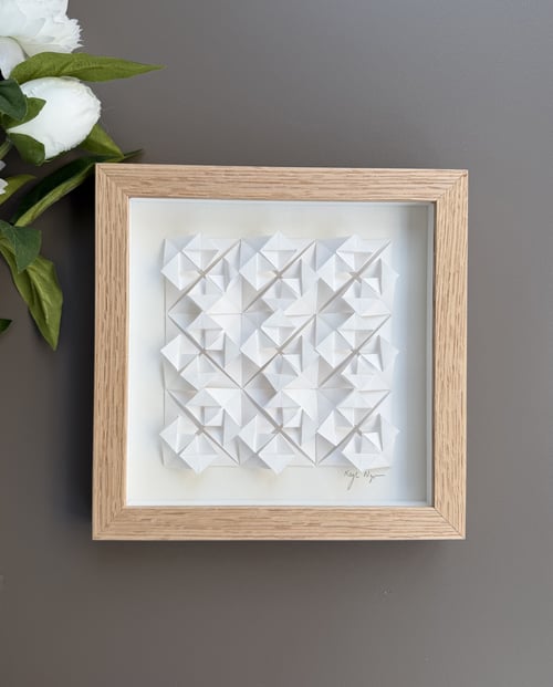 20x20cm, foldet værk, indrammet 