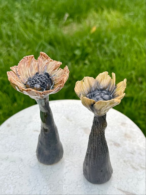 Blomsterpar m håndformede blade
