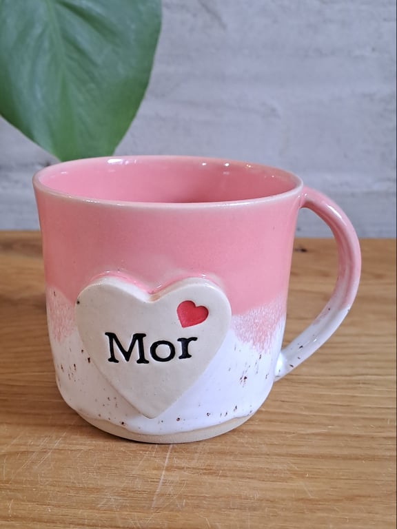 Mor koppen kan indeholde 325 ml.