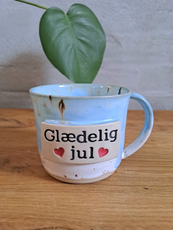 Glædelig jul koppen kan indeholde 350 ml.