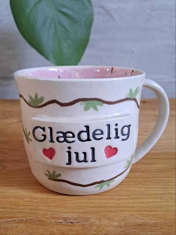 Glædelig jul koppen kan indeholde 350 ml. 