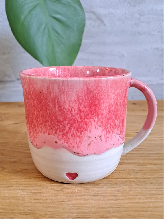 Oneheart koppen kan indeholde 350 ml.