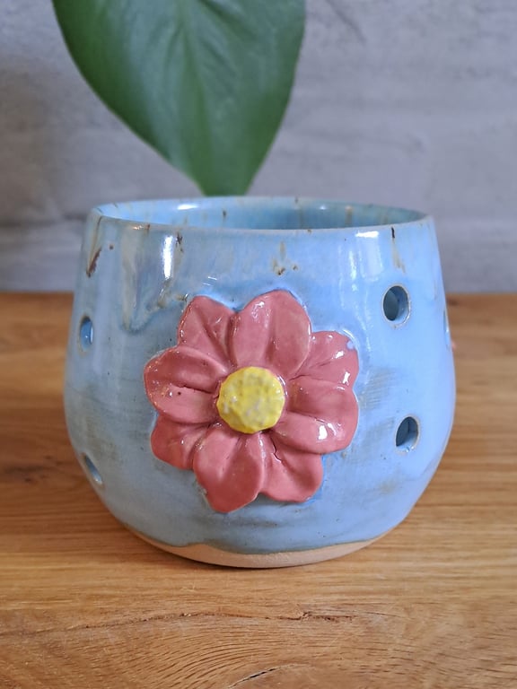 Fyrfadsstage med blomster