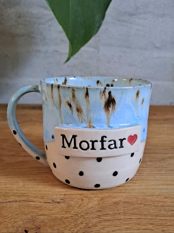 Morfar koppen kan indeholde 350 ml.
