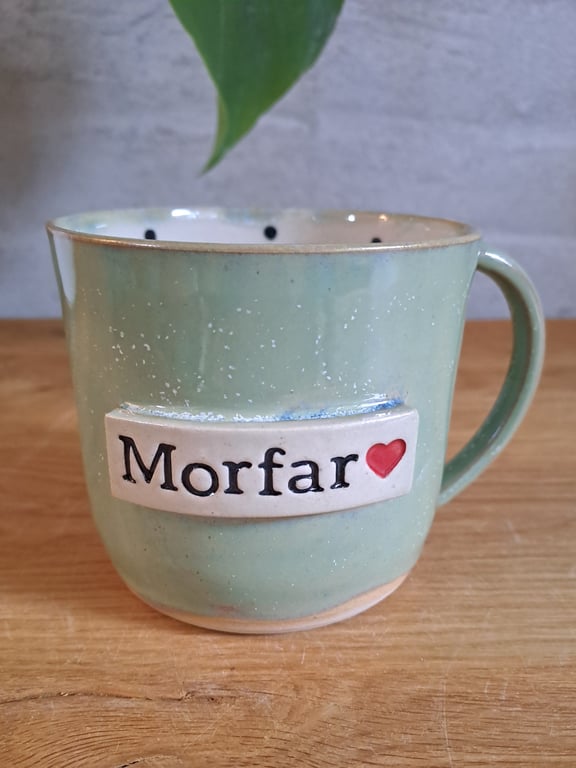 Morfar koppen kan indeholde 375 ml.