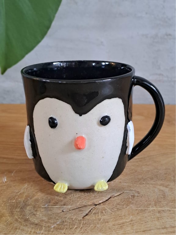 Pingvin koppen kan indeholde 350 ml.