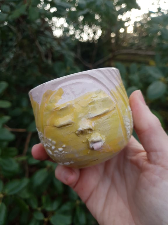 Kop der rækker tunge uden hank