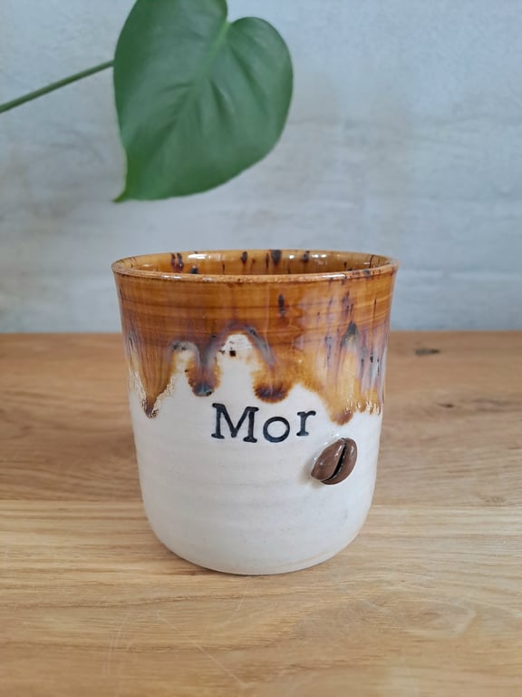 Mor koppen kan indeholde 325 ml.