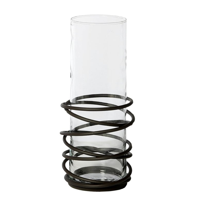 Højt, klart glas med en dekorativ sort spiralformet metalramme omkring midten.