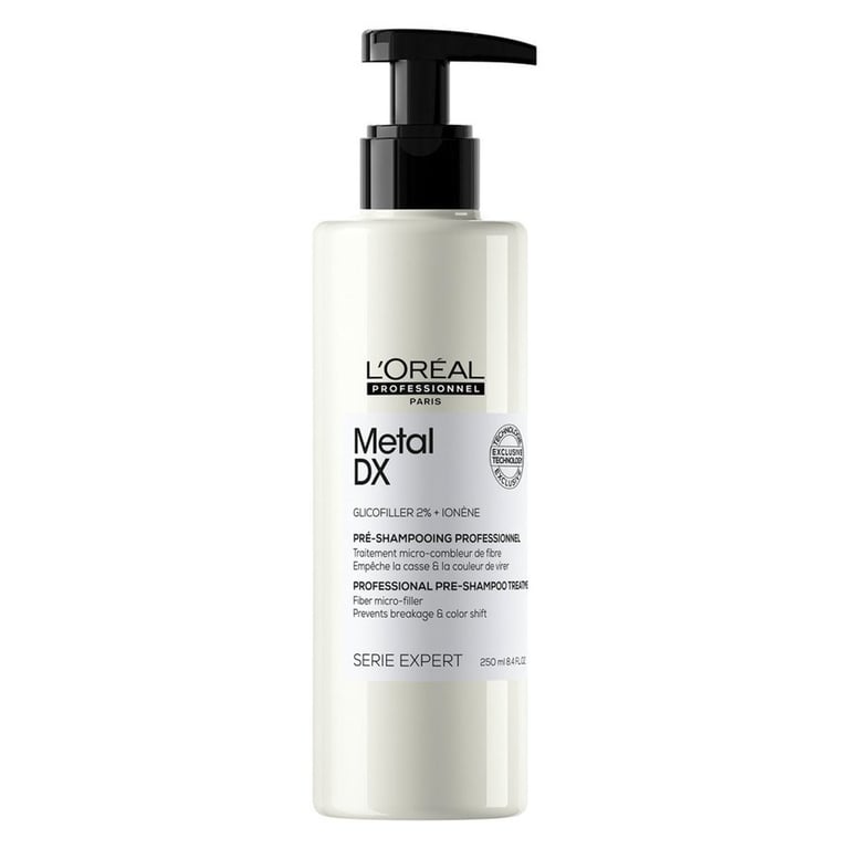 Flaske med L'Oréal Professionnel Metal DX Serie Expert professionel pre-shampoo behandling.