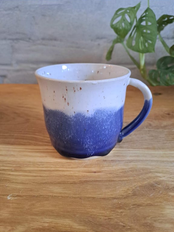 Koppen kan indeholde 350 ml.