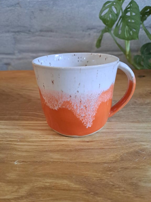 Koppen kan indeholde 325 ml.