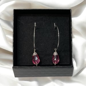 Lyserød øreringe  – produktbillede