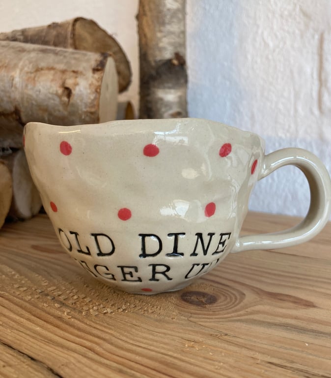 “Fold dine vinger ud” krus