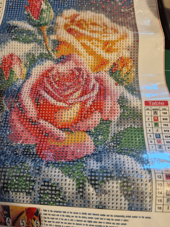 Her er der et rigtig pænt rose billede den er 20×30 