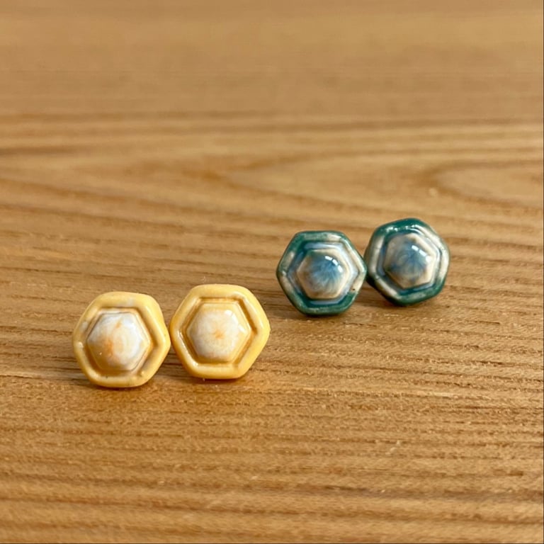 Blå og gul/orange Ørestikkere billede 2