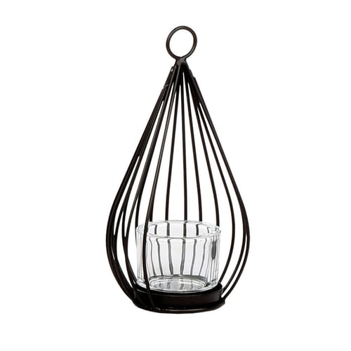 Sort metallisk lygteholder med glasbeholder indeni, designet til at holde et fyrfadslys. (1)
