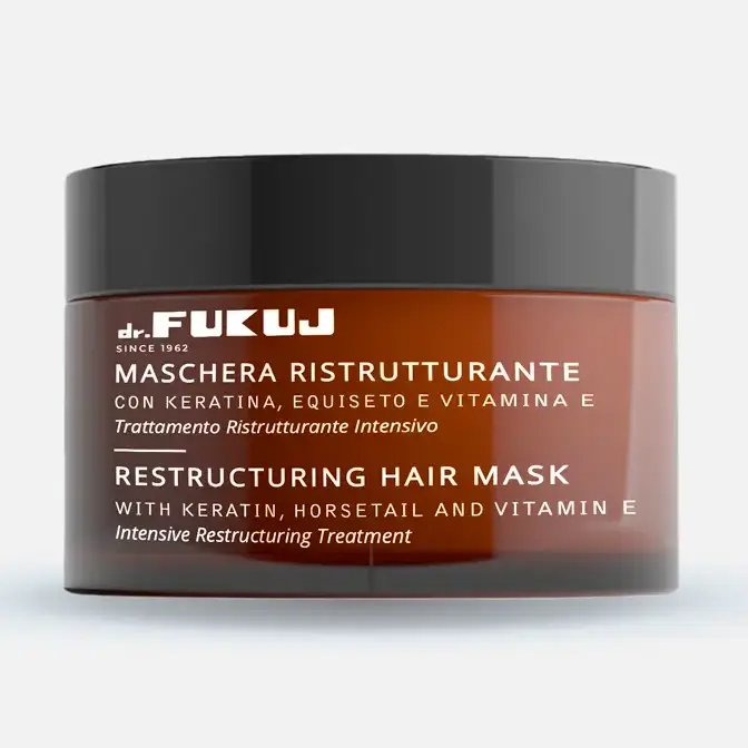 Brun krukke med sort låg indeholdende dr. Fukuji restructure hårrmaske med keratin, hestetorn og vitamin E.